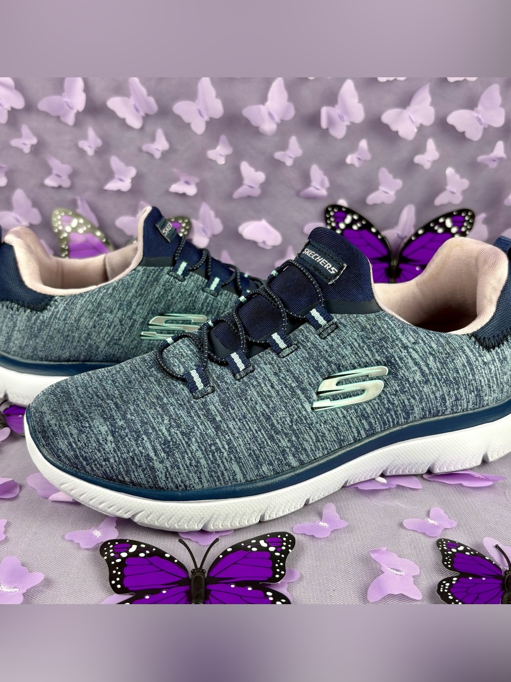 Skechers Slip-On Sneakers in Heathered Navy with Light Pink Trim and Mint Logo